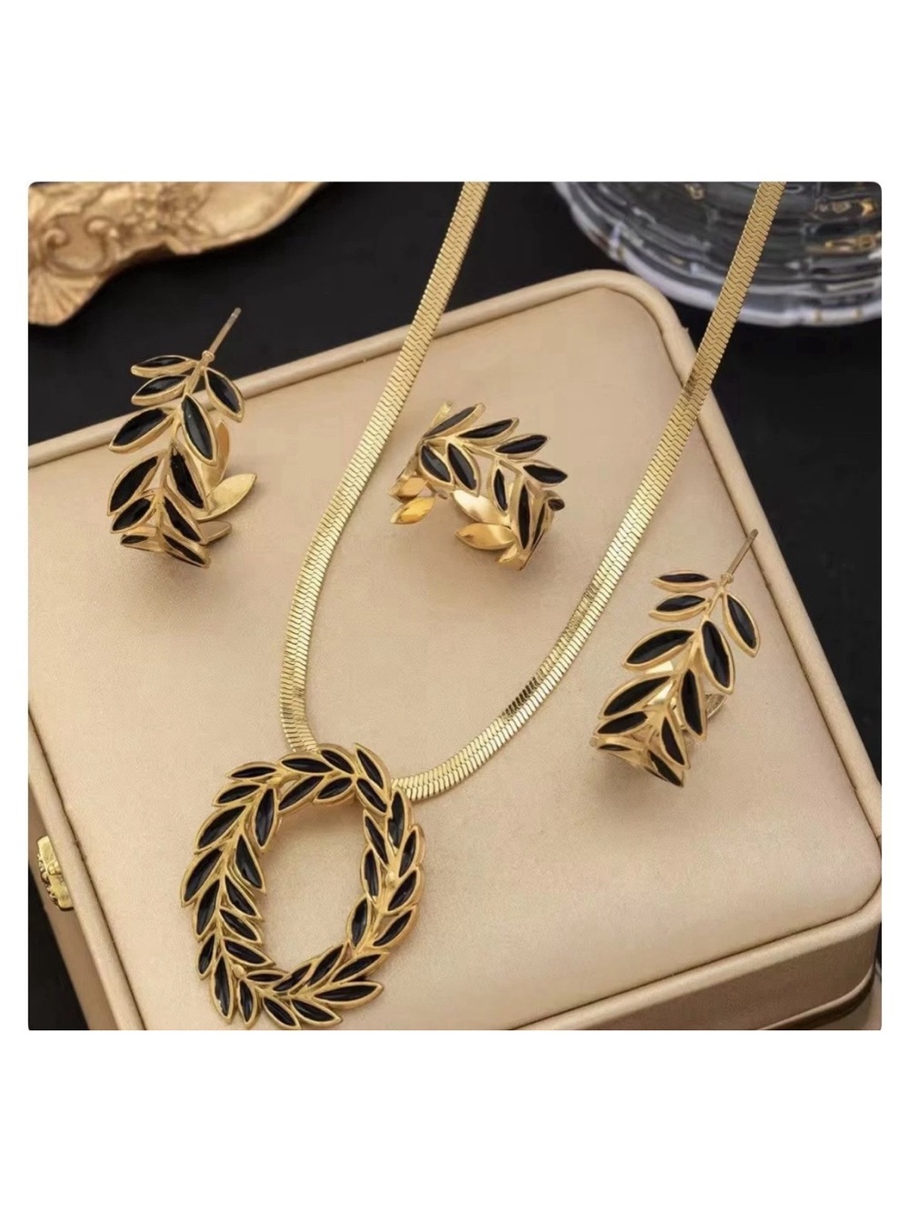 Gold and Black Laurel Leaf Necklace with Matching Earrings and Ring Set